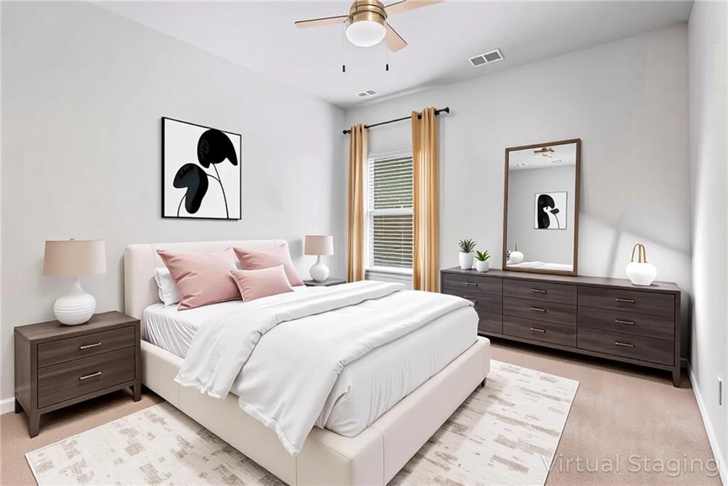 23 Carrington Way Newnan, GA 30265 - Photo 23 of 37 a bedroom with a bed and a dresser