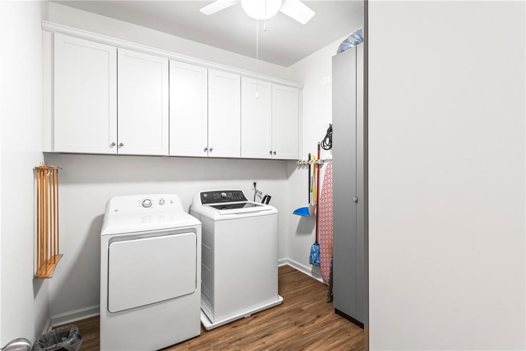 23 Carrington Way Newnan, GA 30265 - Photo 24 of 37 a view of a storage and utility room with washer and dryer