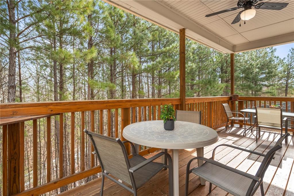23 Carrington Way Newnan, GA 30265 - Photo 29 of 37 a view of a balcony with table and chairs