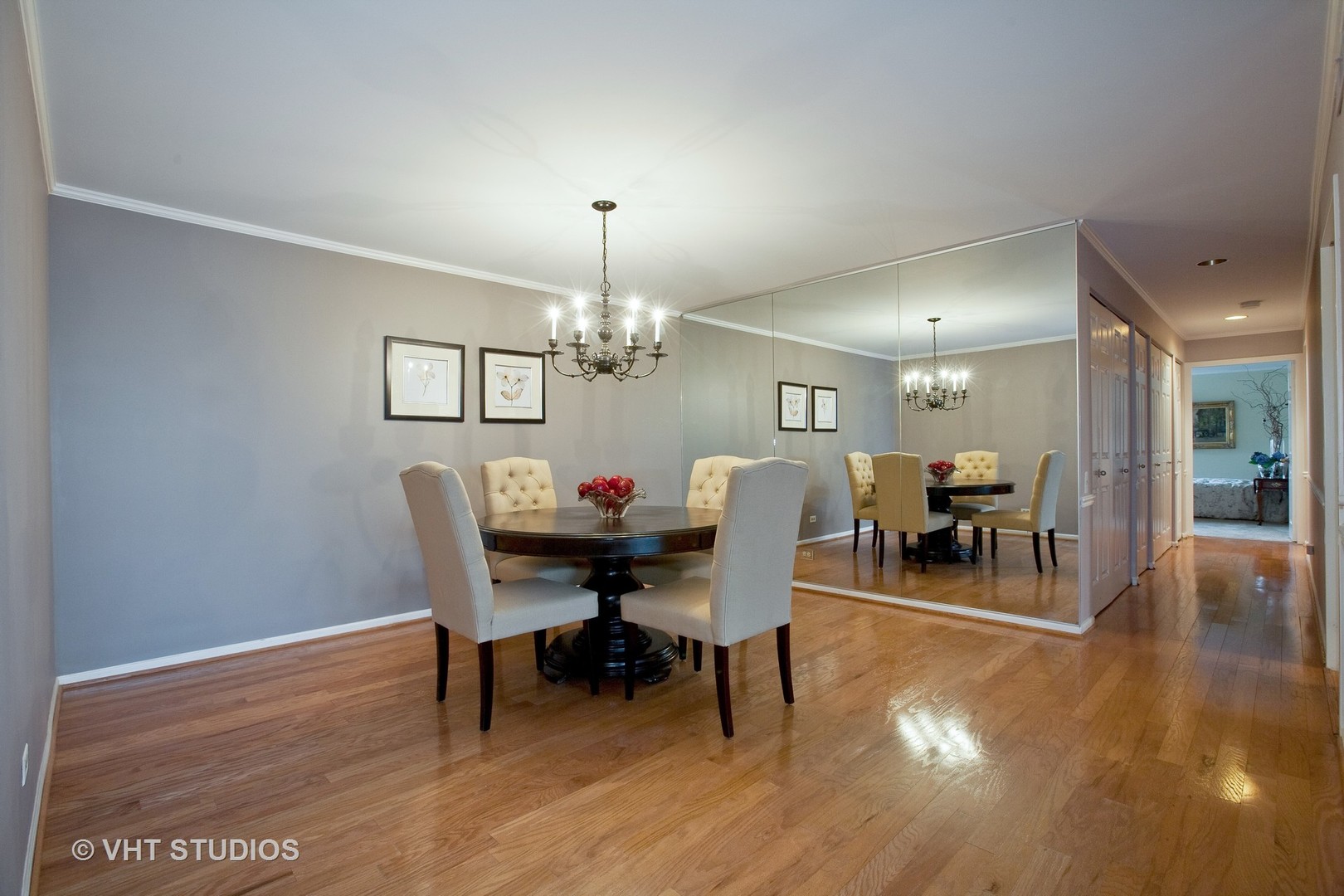 1140 Old Mill Road, Unit 408F Hinsdale, IL 60521 - Photo 4 of 11 a view of a dining room with furniture and wooden floor