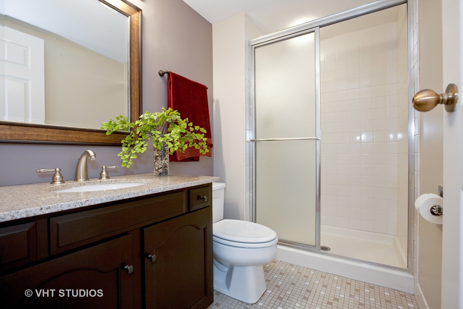 1140 Old Mill Road, Unit 408F Hinsdale, IL 60521 - Photo 10 of 11 a bathroom with a granite countertop sink and a mirror