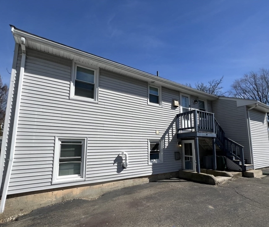 10 Edgemere Road Quincy, MA 02169 - Photo 22 of 25 a view of a house with a garage