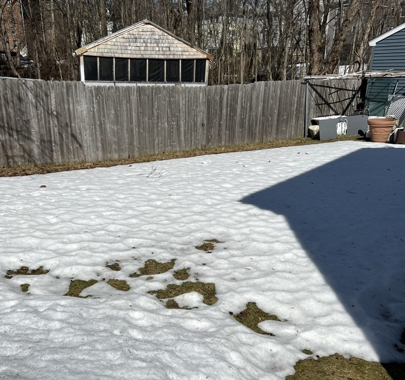 10 Edgemere Road Quincy, MA 02169 - Photo 25 of 25 a front view of a house with a yard