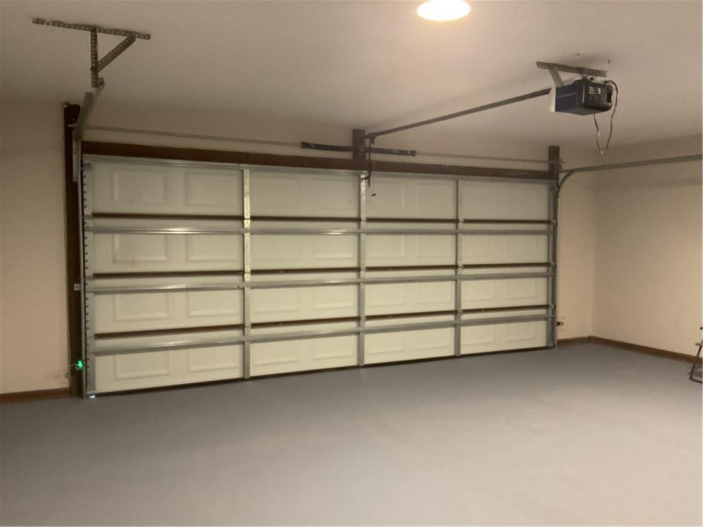 2452 Kilgore Road Buford, GA 30519 - Photo 15 of 16 a view of a room with a empty racks on the wall