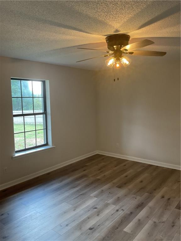 2452 Kilgore Road Buford, GA 30519 - Photo 16 of 16 a view of an empty room and window