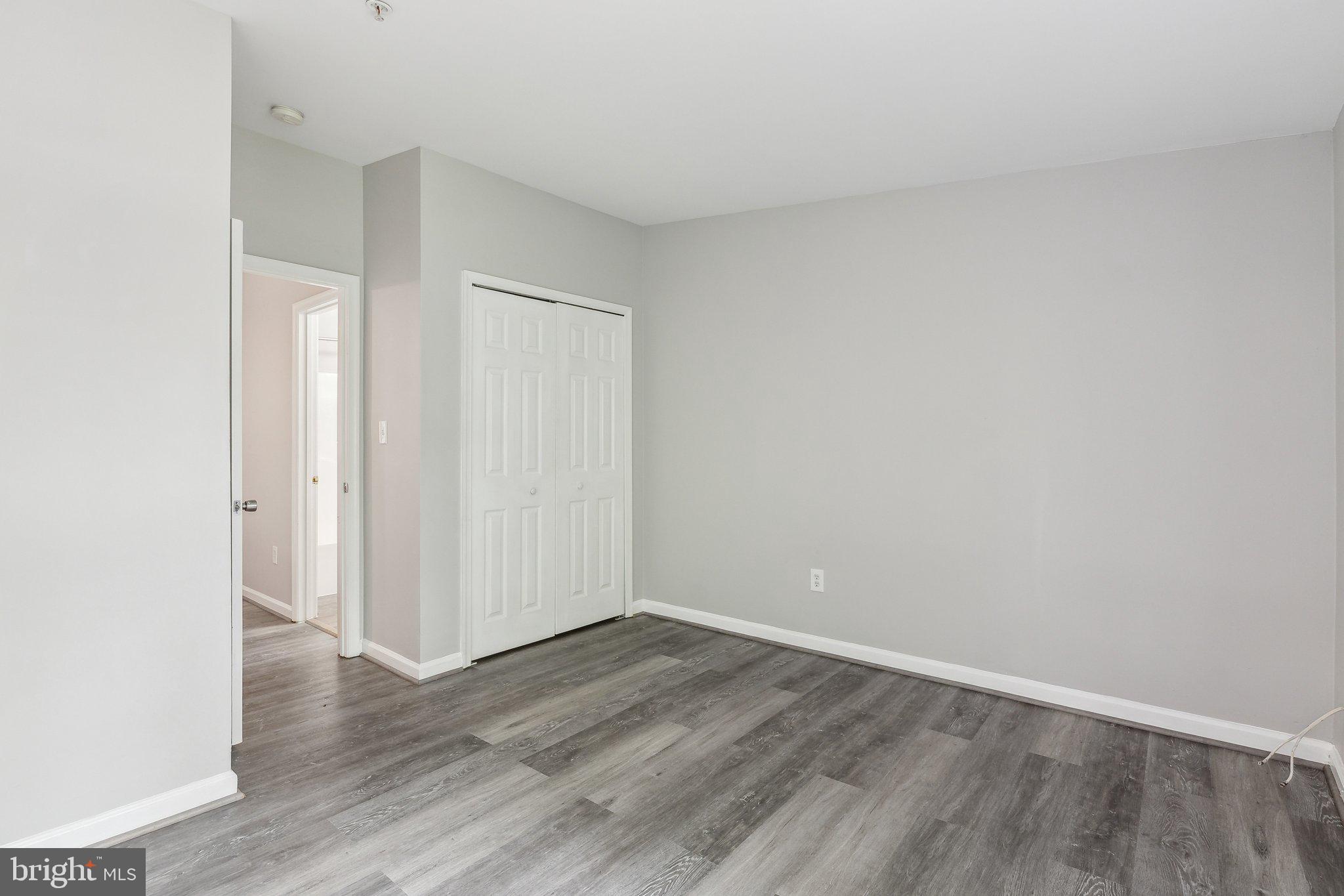 28 Johnson Place Annapolis, MD 21401 - Photo 11 of 35 a view of an empty room with wooden floor