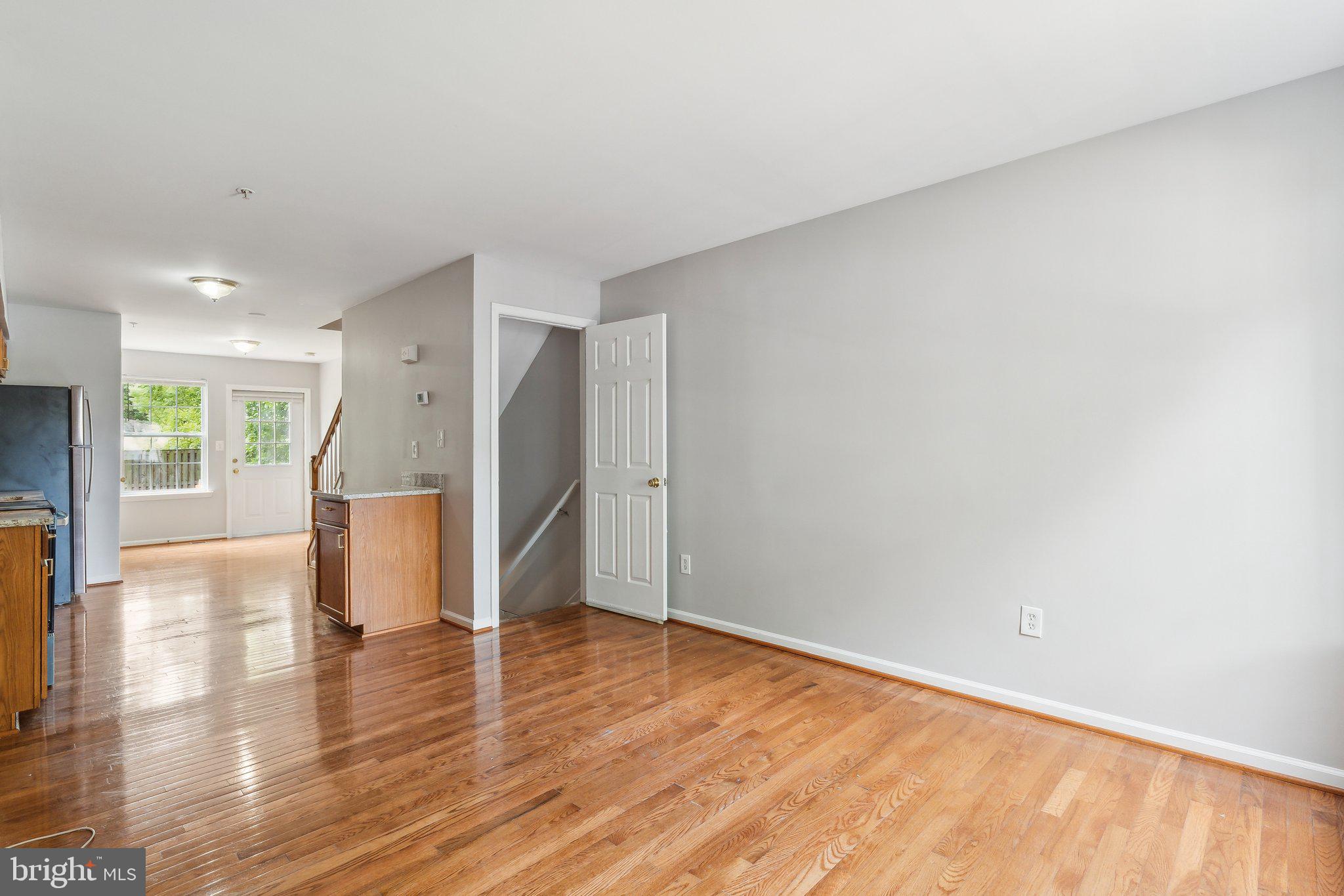 28 Johnson Place Annapolis, MD 21401 - Photo 17 of 35 a view of empty room with wooden floor and a window