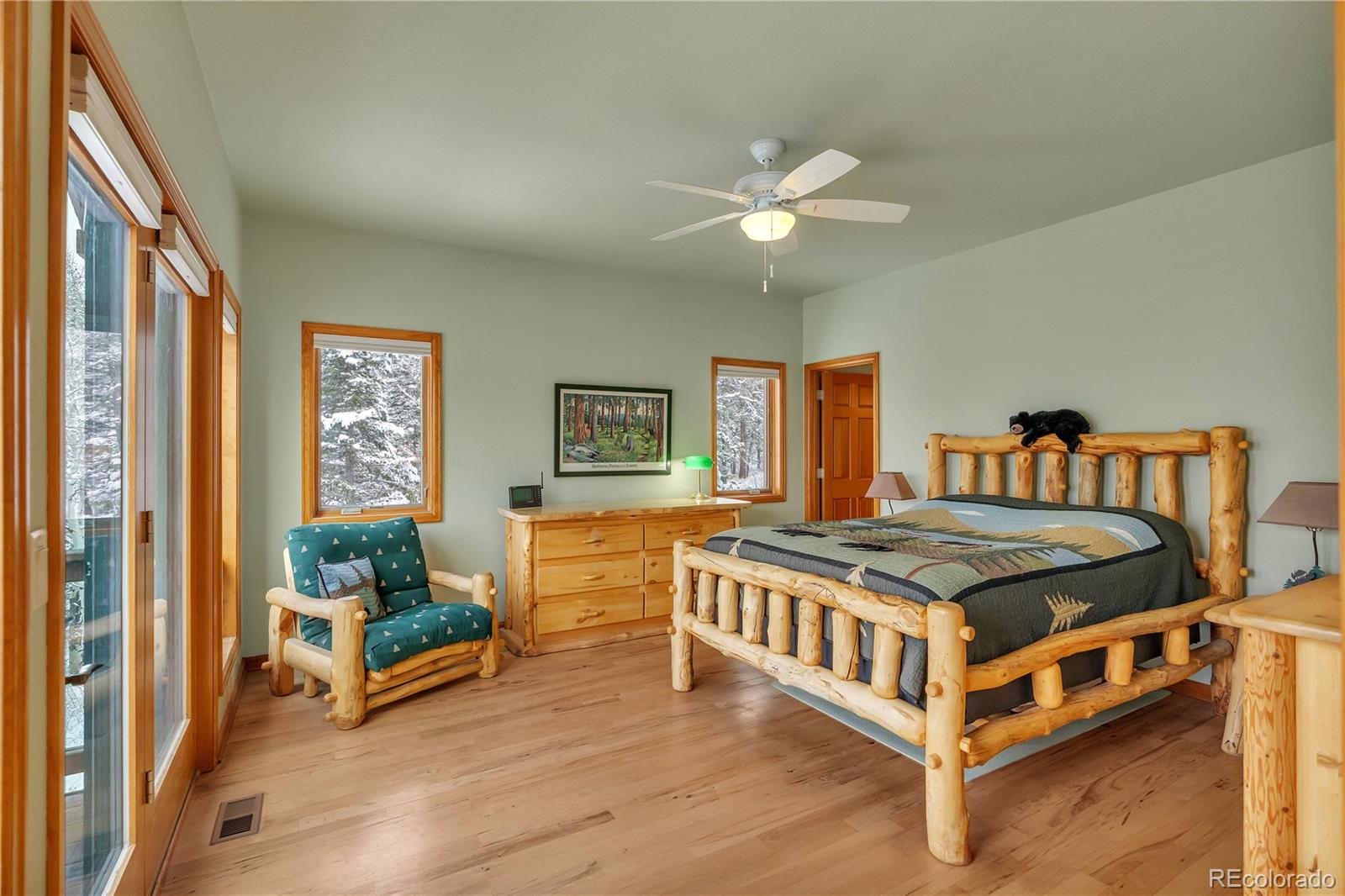 2147 McGraw Ranch Road Estes Park, CO 80517 - Photo 14 of 26 a bedroom with a bed and a window