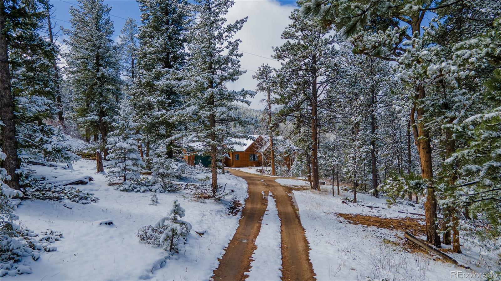 2147 McGraw Ranch Road Estes Park, CO 80517 - Photo 4 of 26 a view of an outdoor space with a lake view