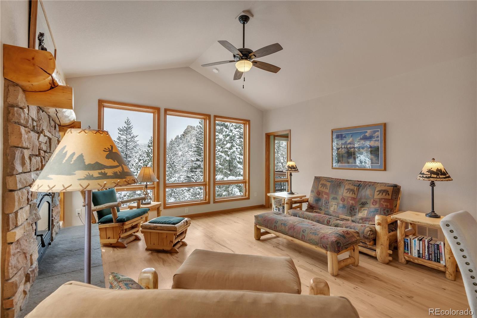 2147 McGraw Ranch Road Estes Park, CO 80517 - Photo 6 of 26 a living room with furniture and a large window