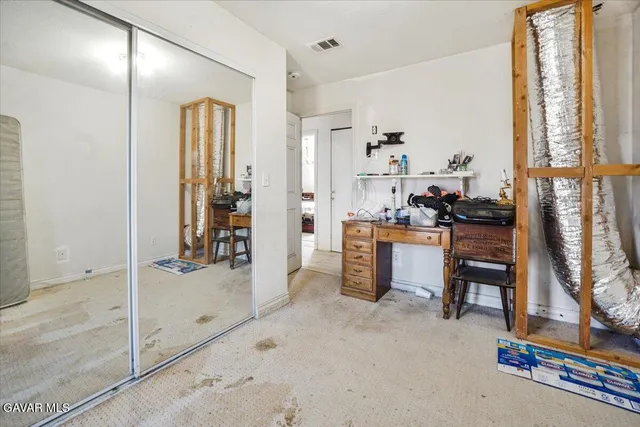a bathroom with a shower and a sink