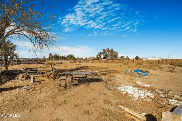 a view of gym equipment and floor to ceiling window