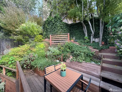 a view of a outdoor sitting area with furniture