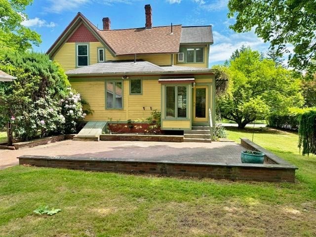 60 Massasoit Street Northampton, MA 01060 - Photo 2 of 19 a front view of a house with a yard