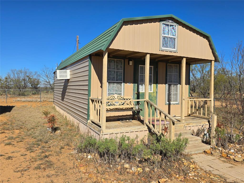 5780 County Road 266 Rochelle, TX 76872 - Photo 10 of 40 a view of a house with a yard