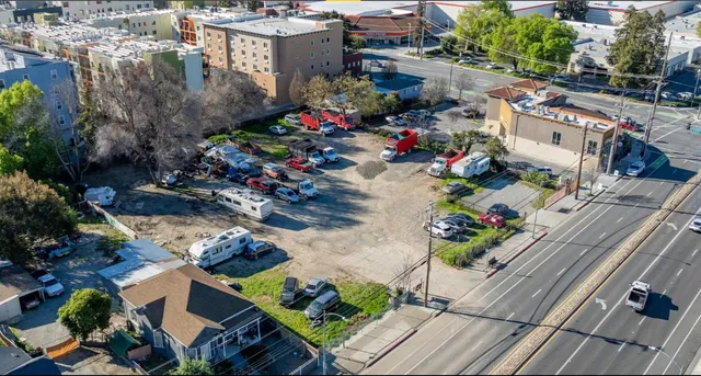 a view of a street with cars
