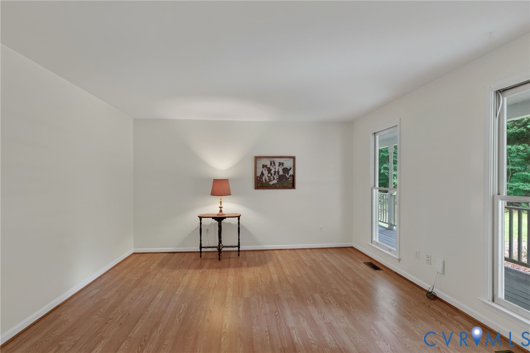 3007 Five Forks Road Pamplin, VA 23958 - Photo 12 of 82 Light wood-finish flooring with white walls and tr