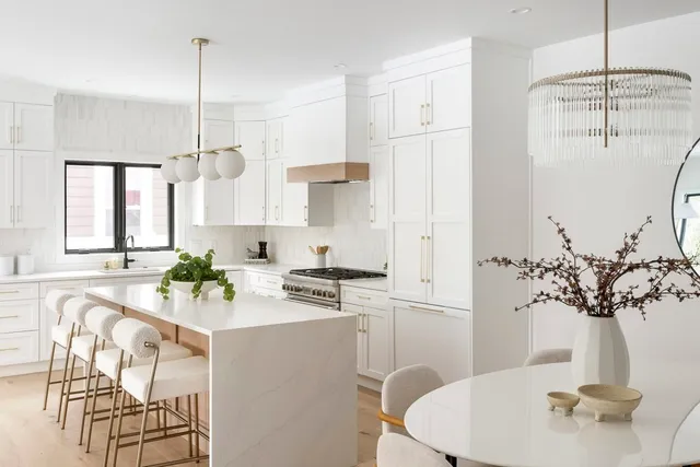 a very nice looking dining room with a table and chairs