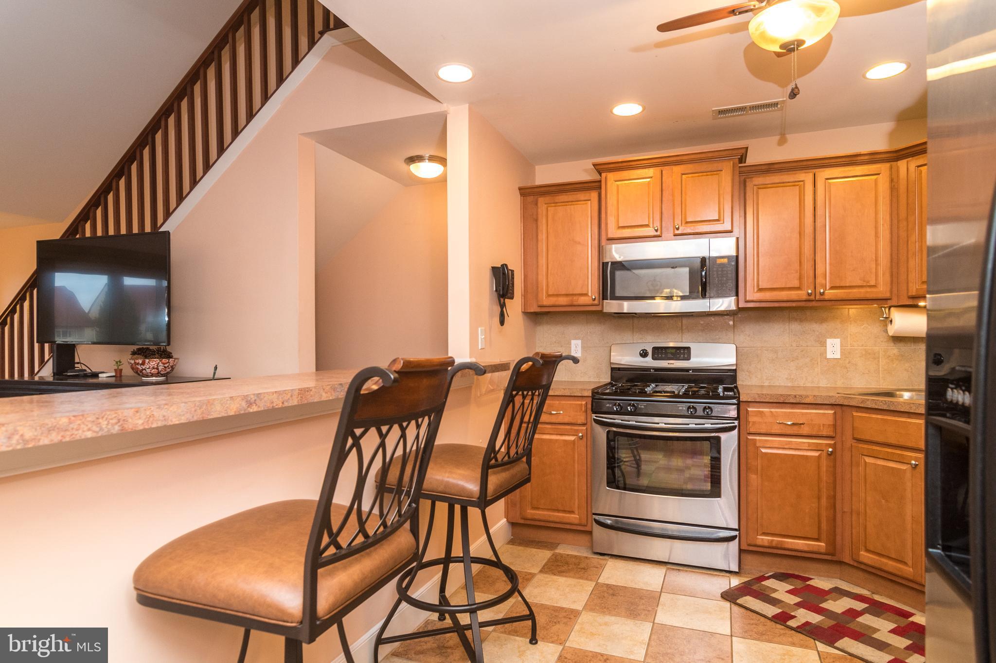 1630 Welsh Road, Unit 4A Philadelphia, PA 19115 - Photo 24 of 35 Breakfast Bar overlooking the Living Room