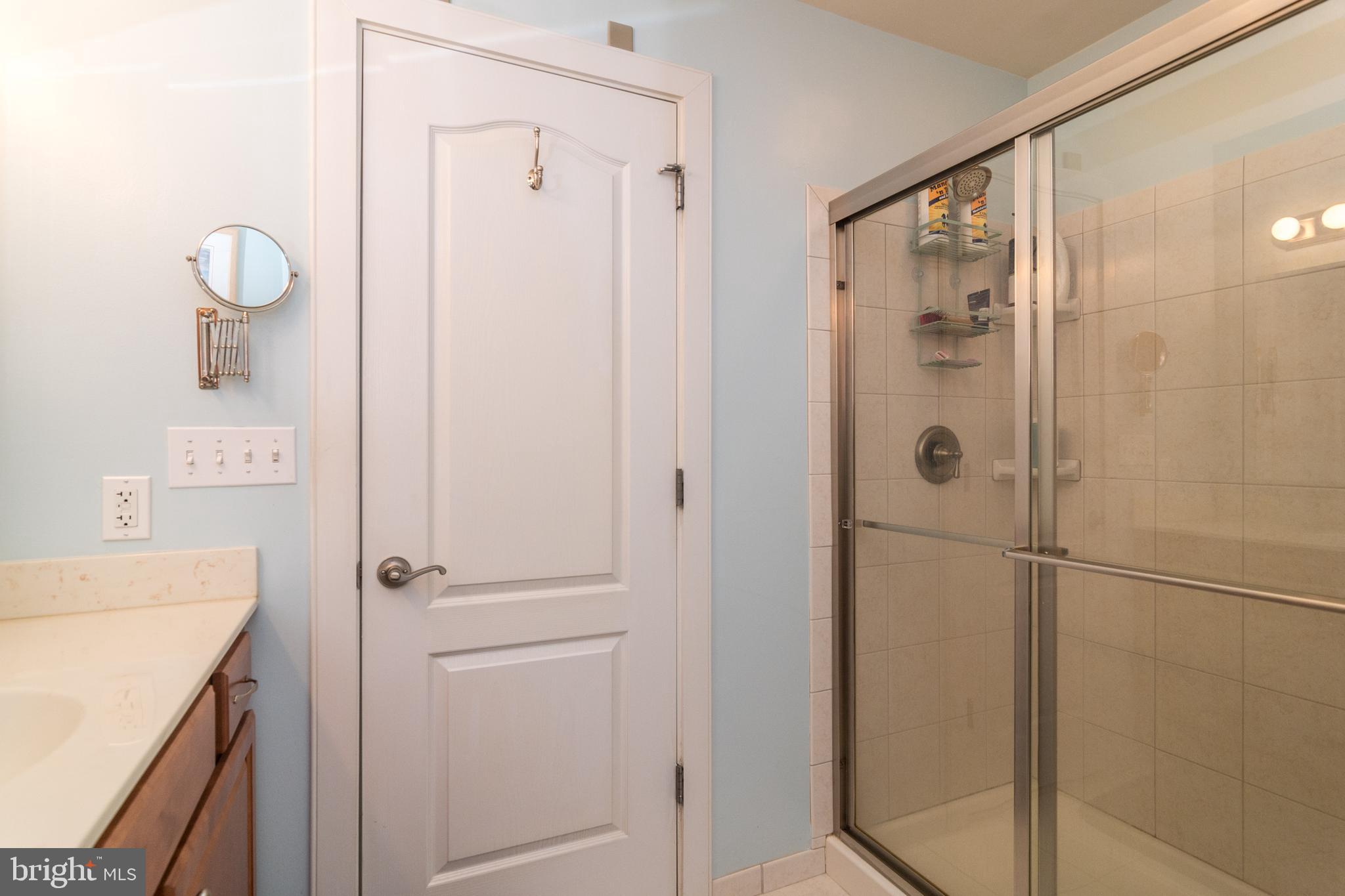 1630 Welsh Road, Unit 4A Philadelphia, PA 19115 - Photo 34 of 35 Hall Bathroom with Double Shower and linen closet