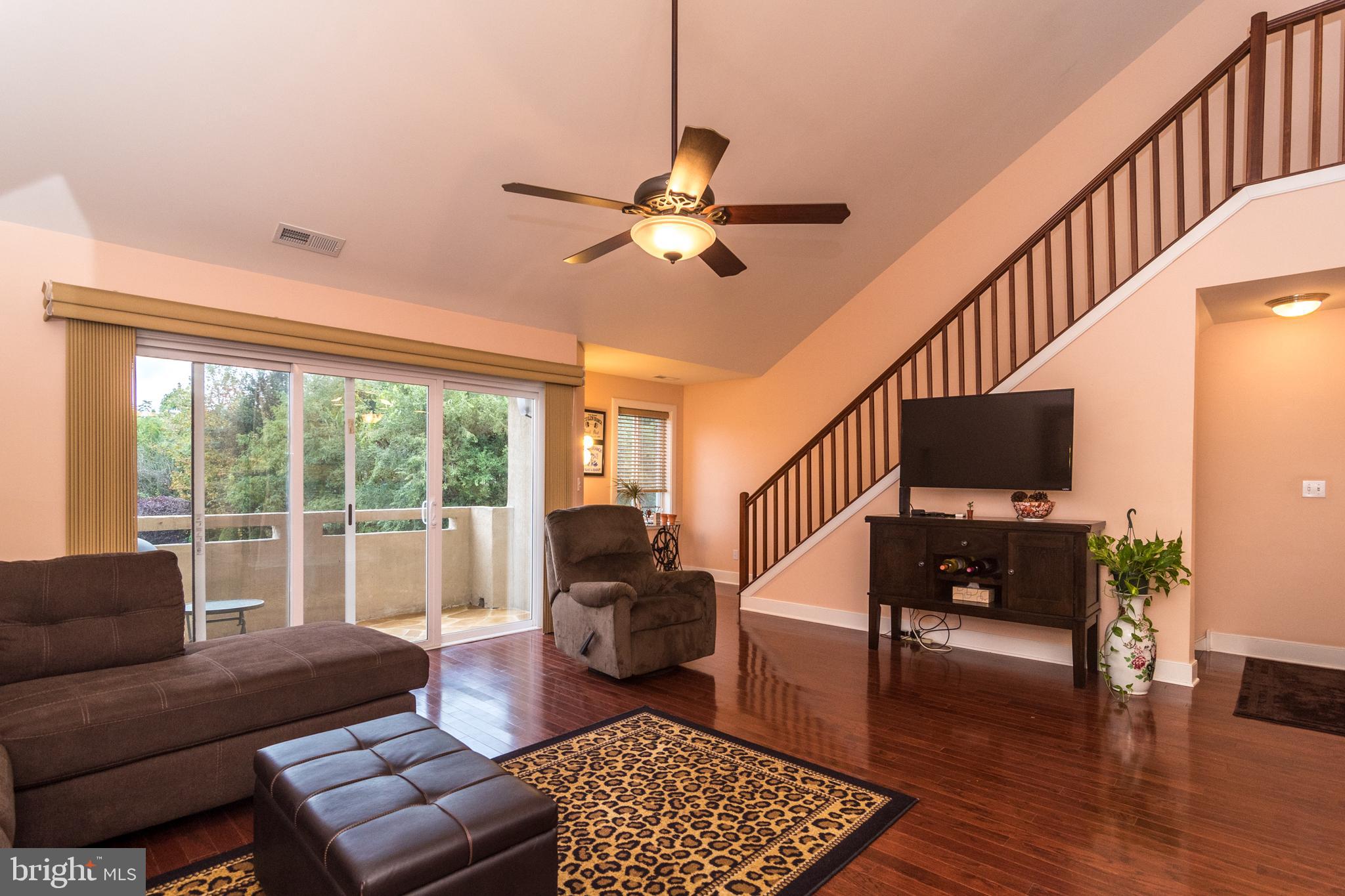 1630 Welsh Road, Unit 4A Philadelphia, PA 19115 - Photo 10 of 35 Living Room with Sliders to Balcony