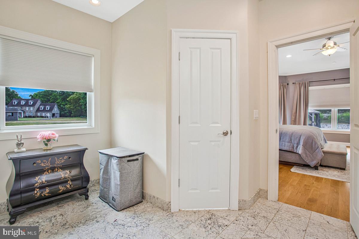 5 Jessie Road Harwood, MD 20776 - Photo 41 of 87 a bedroom with furniture and a window