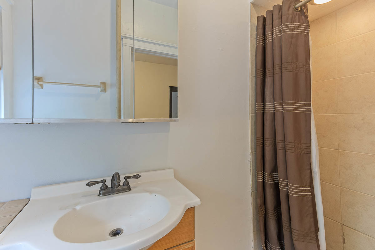 601 West Fullerton Avenue, Unit 1 Chicago, IL 60614 - Photo 18 of 25 a bathroom with a sink and mirror