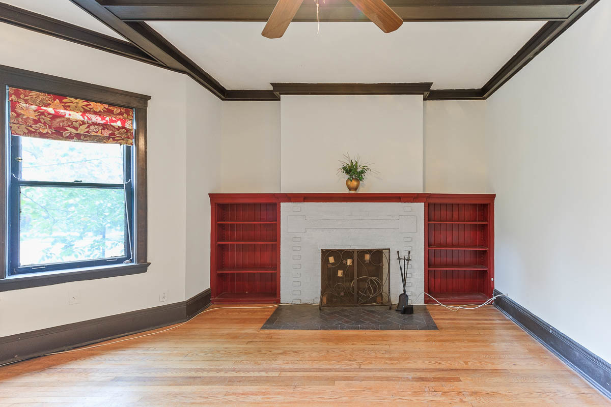 601 West Fullerton Avenue, Unit 1 Chicago, IL 60614 - Photo 5 of 25 a view of an empty room with wooden floor and a window