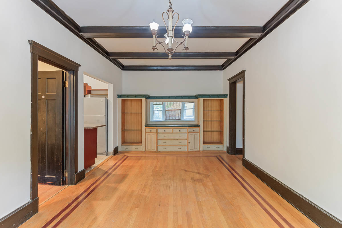 601 West Fullerton Avenue, Unit 1 Chicago, IL 60614 - Photo 10 of 25 a view of an empty room with window and chandelier