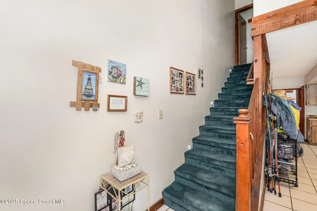 a view of entryway with stairs