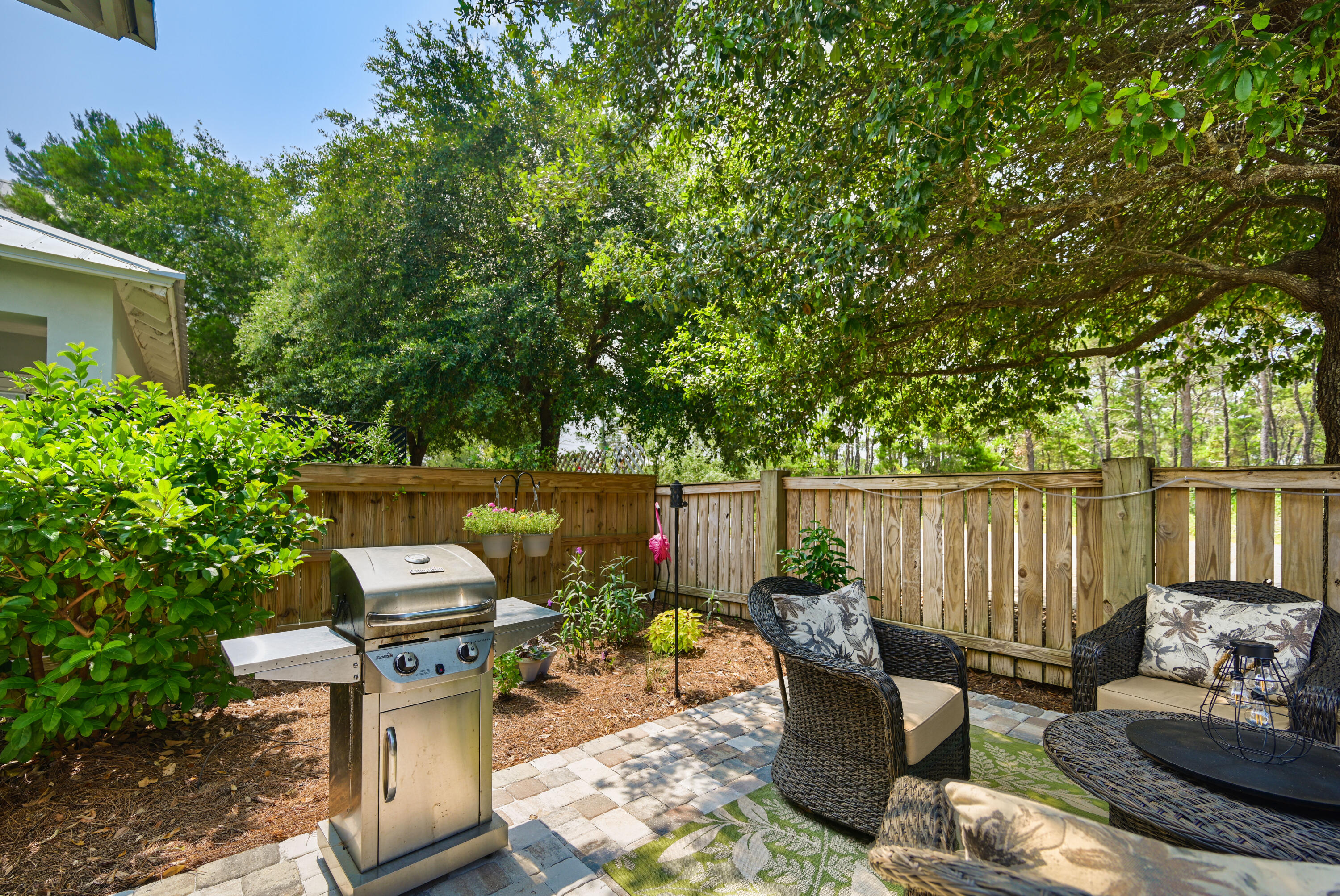 31 West Willow Mist Road Inlet Beach, FL 32461 - Photo 29 of 43 a view of a patio with couches chairs and potted plants