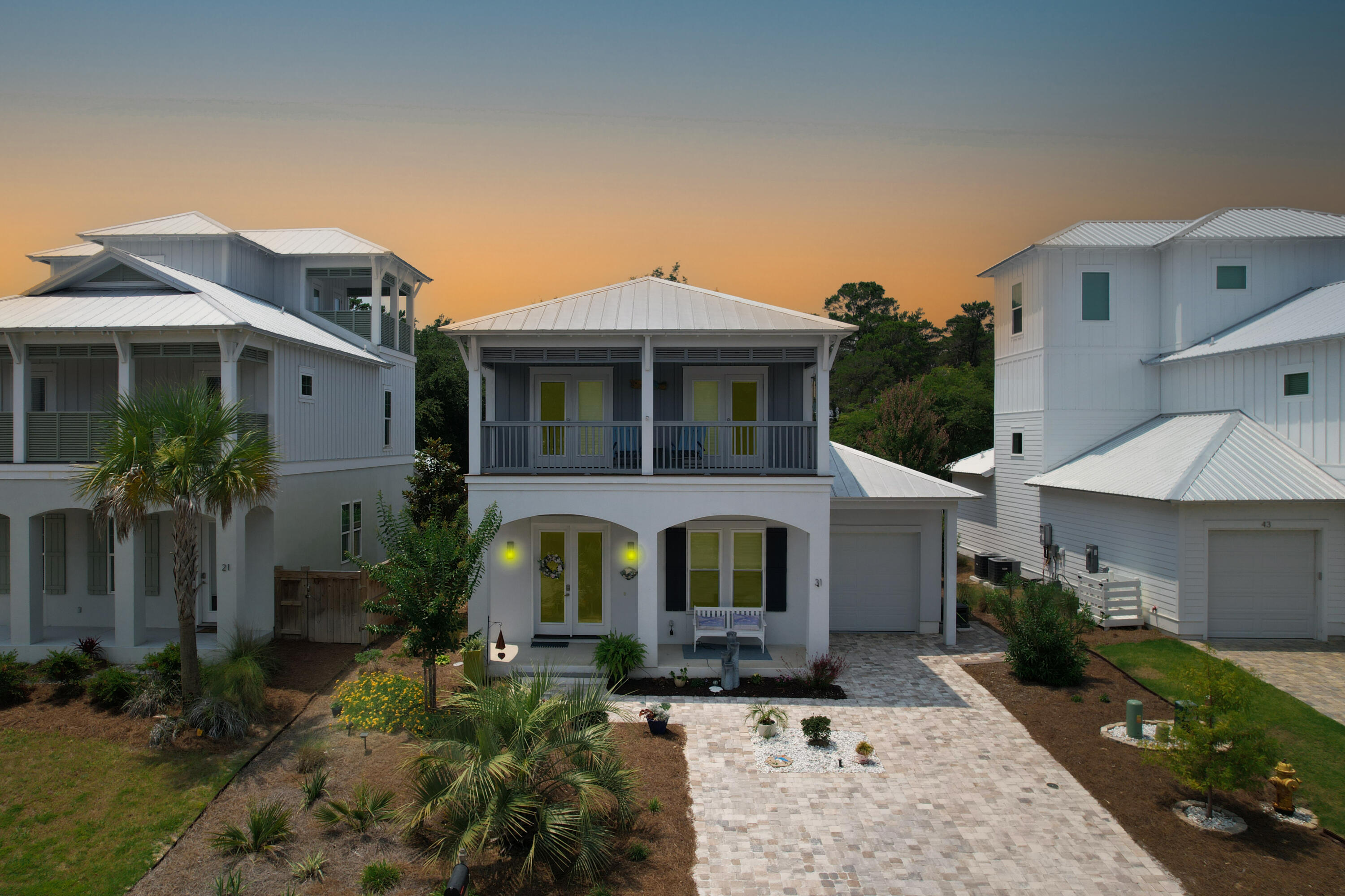 31 West Willow Mist Road Inlet Beach, FL 32461 - Photo 42 of 43 a front view of a house with garden