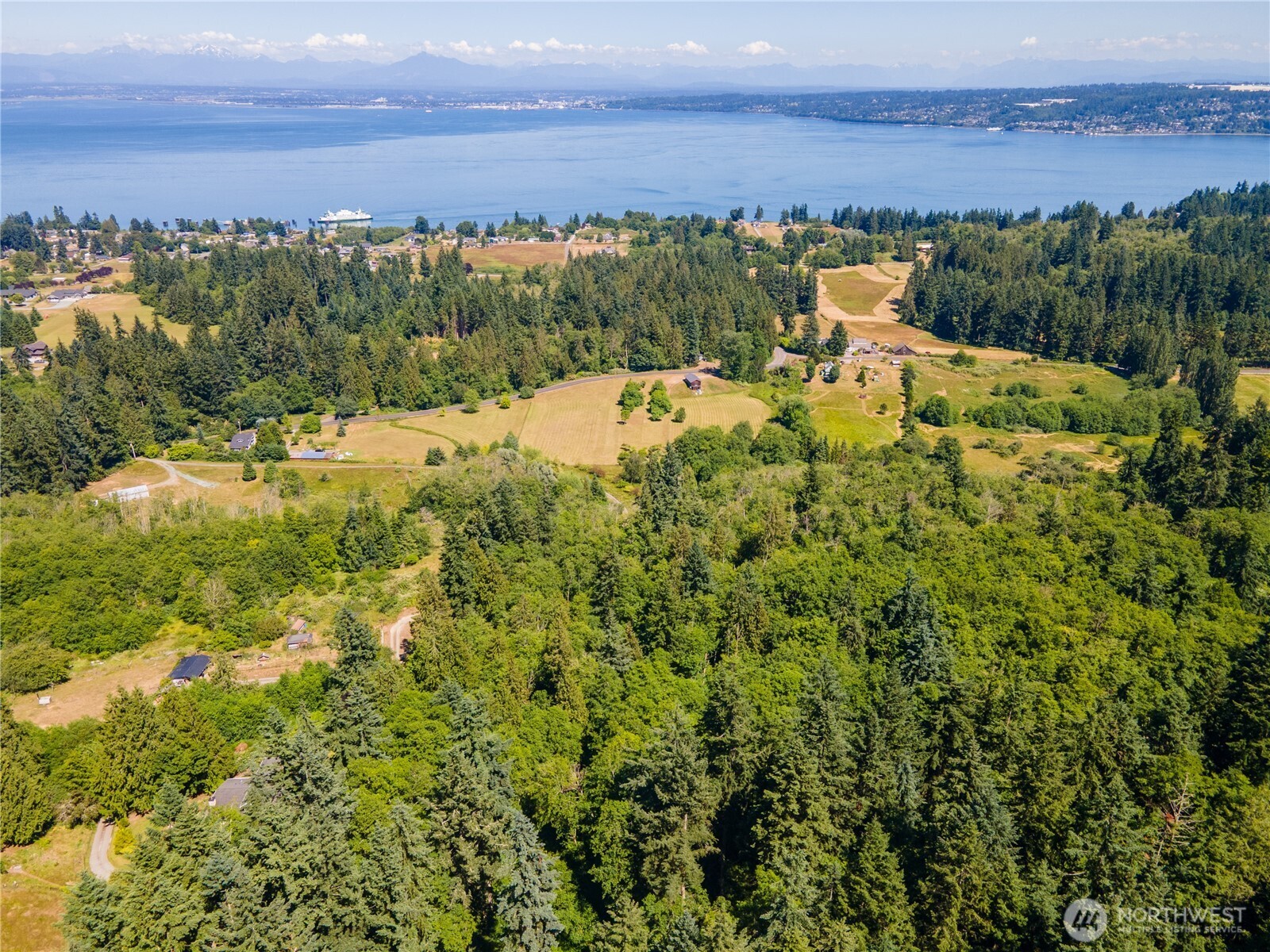 0 East Heggeness Road Clinton, WA 98236 - Photo 2 of 19 an outdoor view of house with ocean view