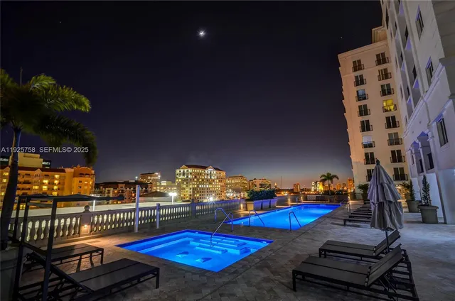 a view of swimming pool from a balcony