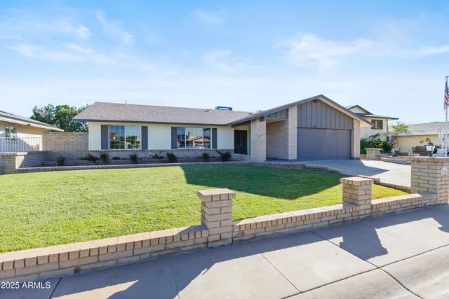 a view of a house with a swimming pool