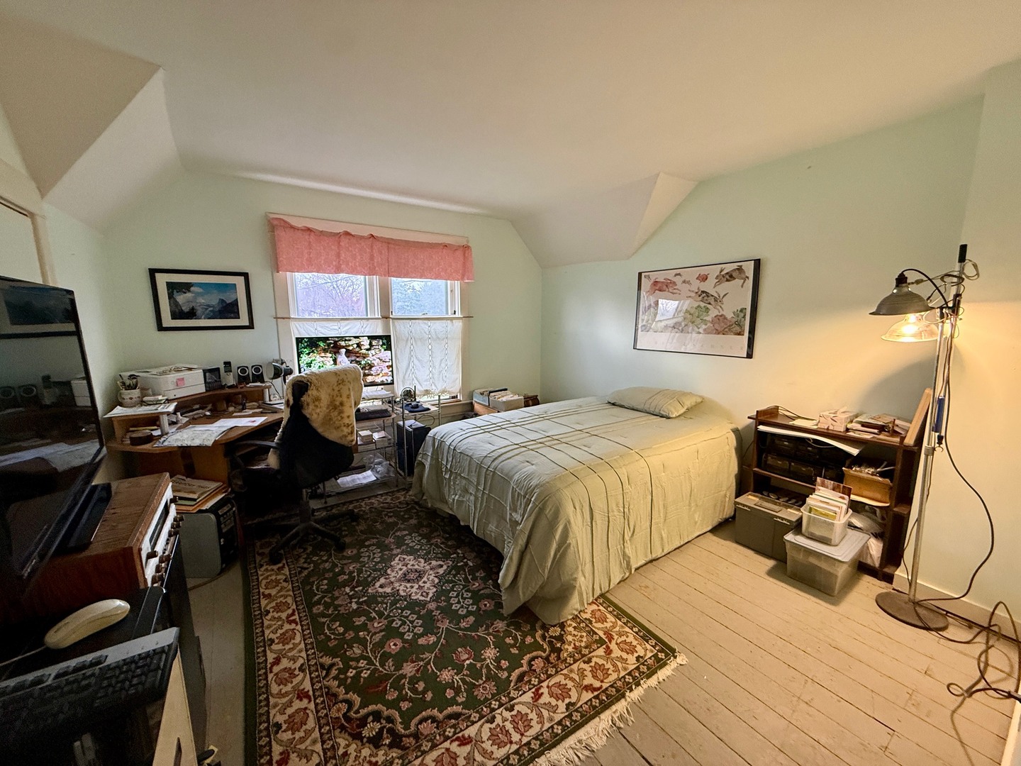 742 South 4th Street DeKalb, IL 60115 - Photo 23 of 46 a bed room with a bed and a desk