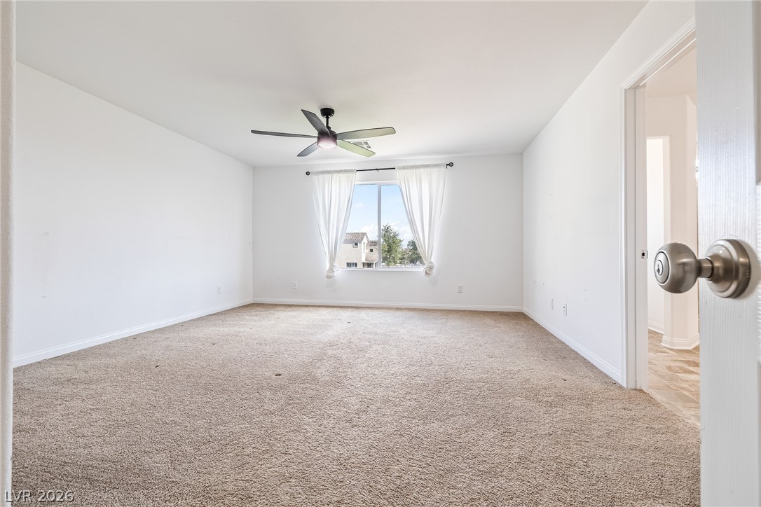 5510 Ripple Ridge Avenue Las Vegas, NV 89139 - Photo 27 of 45 Bright and airy room with a window providing abundant natural light.