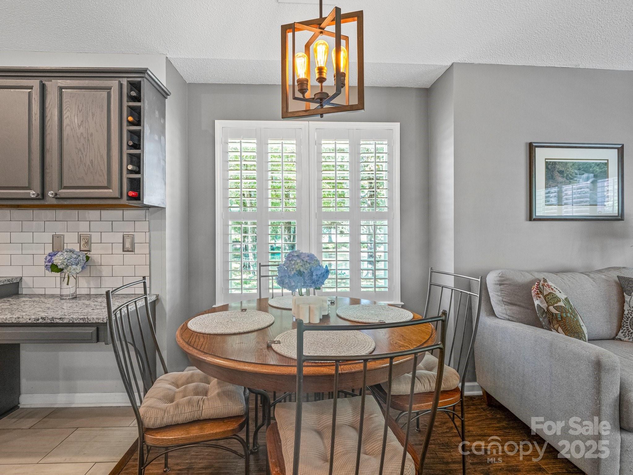 10 Gray Wolf Lane Hendersonville, NC 28792 - Photo 15 of 42 a view of a dining room with furniture and window