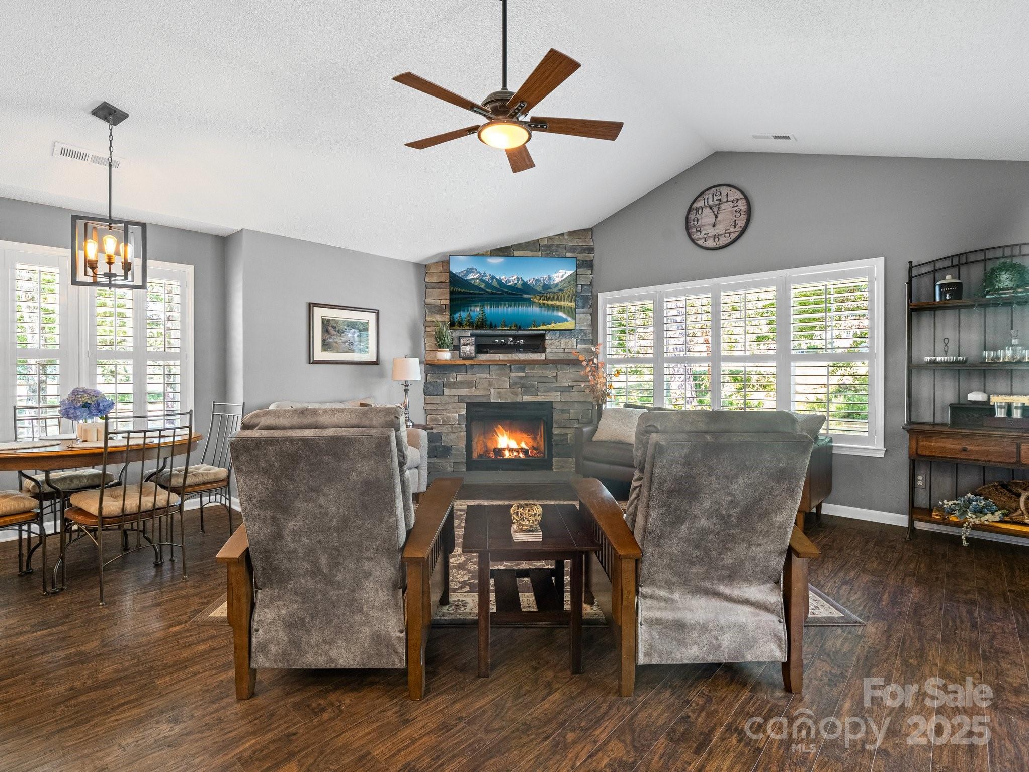 10 Gray Wolf Lane Hendersonville, NC 28792 - Photo 18 of 42 a dining room with furniture a window and wooden floor
