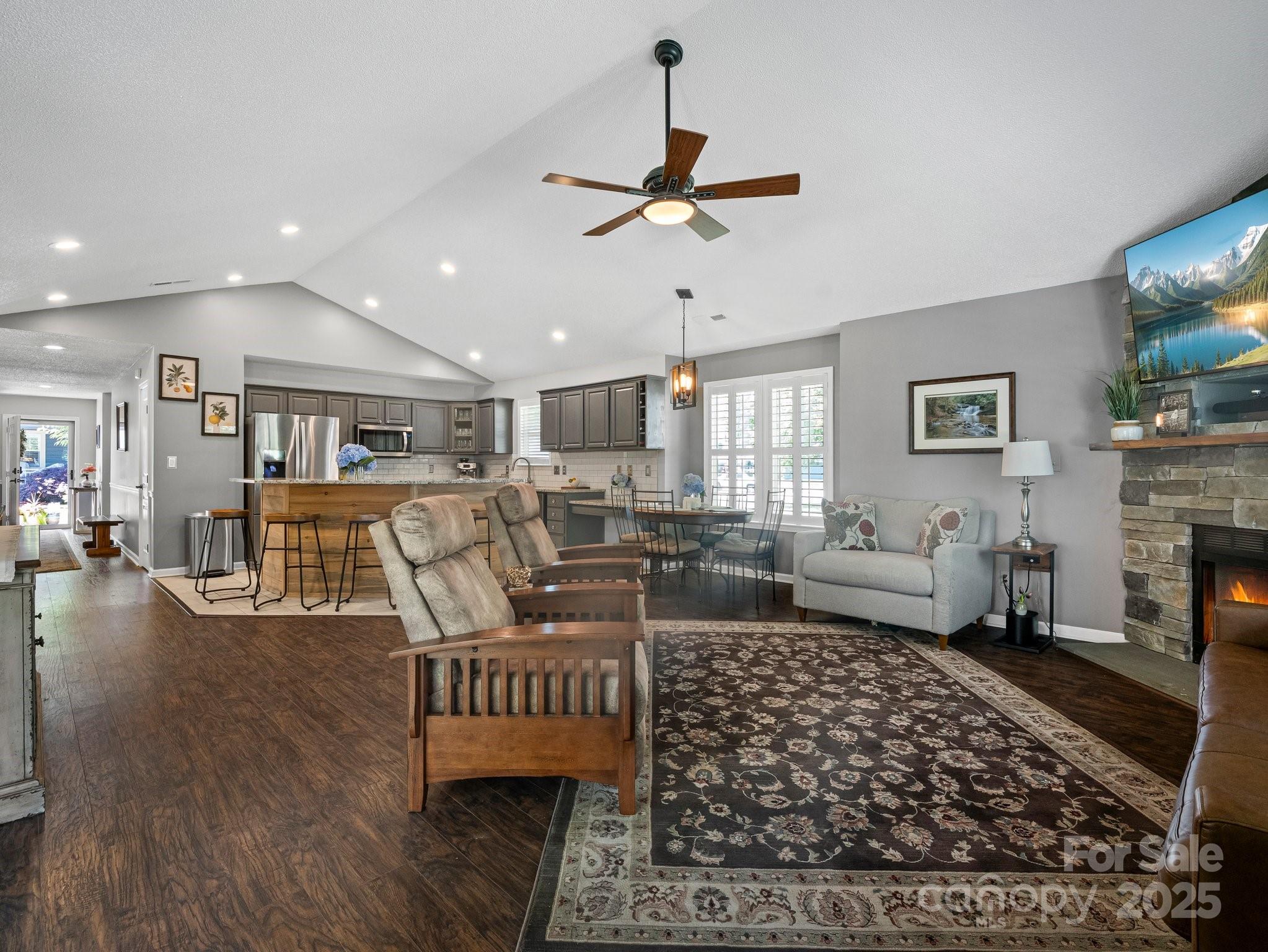 10 Gray Wolf Lane Hendersonville, NC 28792 - Photo 19 of 42 a living room with furniture and a fireplace