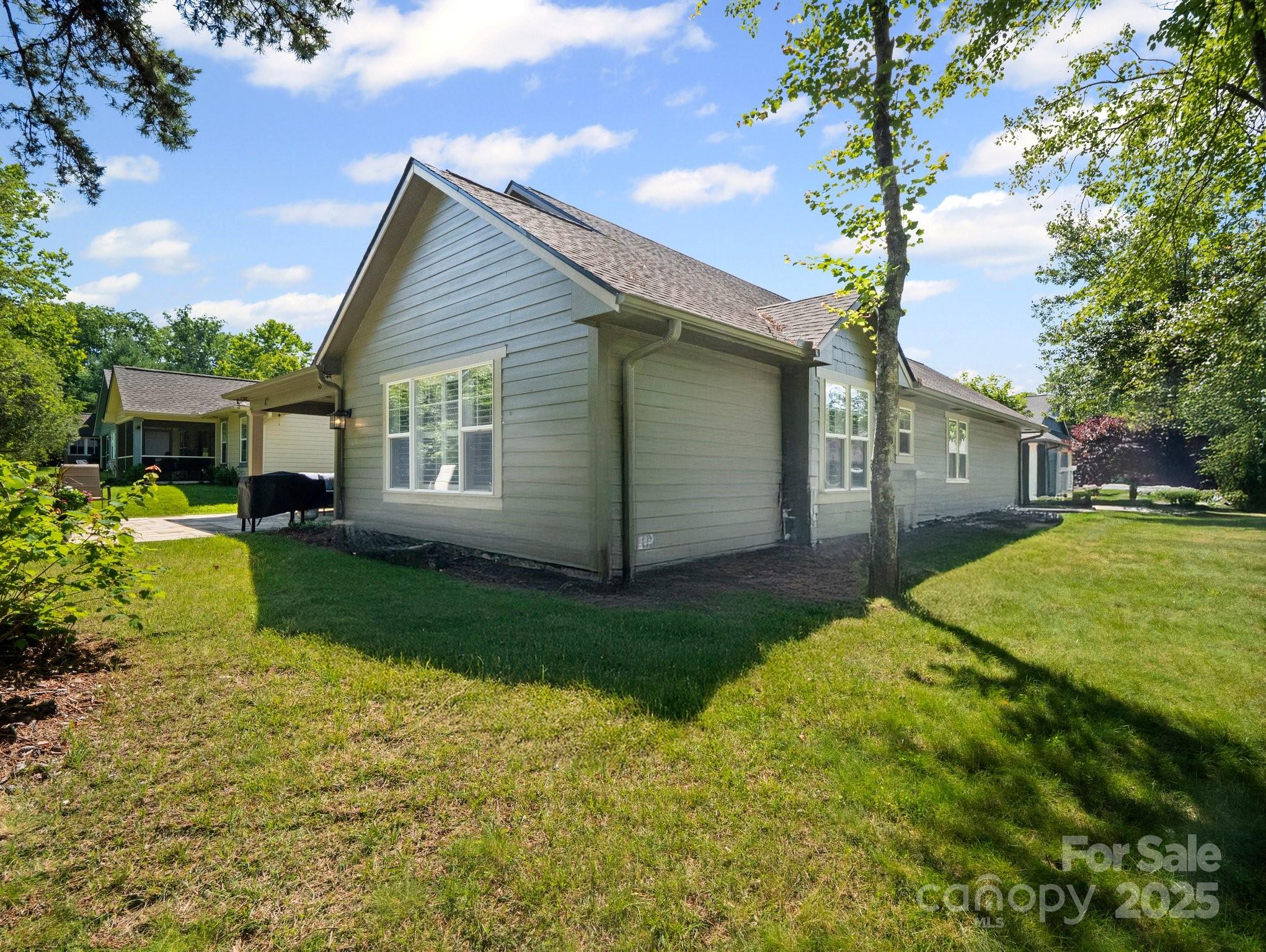 10 Gray Wolf Lane Hendersonville, NC 28792 - Photo 31 of 42 a front view of a house with a garden