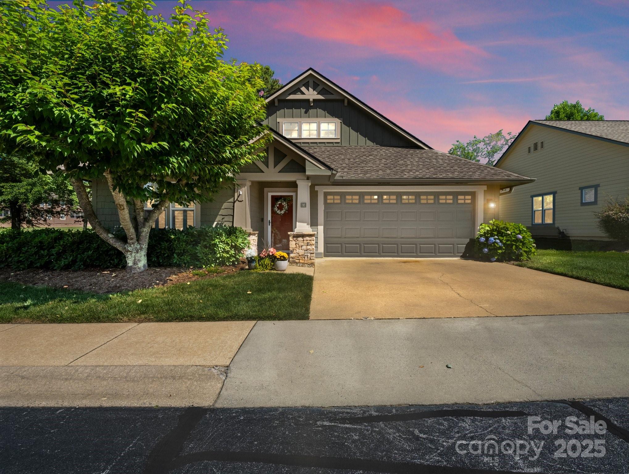 10 Gray Wolf Lane Hendersonville, NC 28792 - Photo 4 of 42 a front view of a house with yard