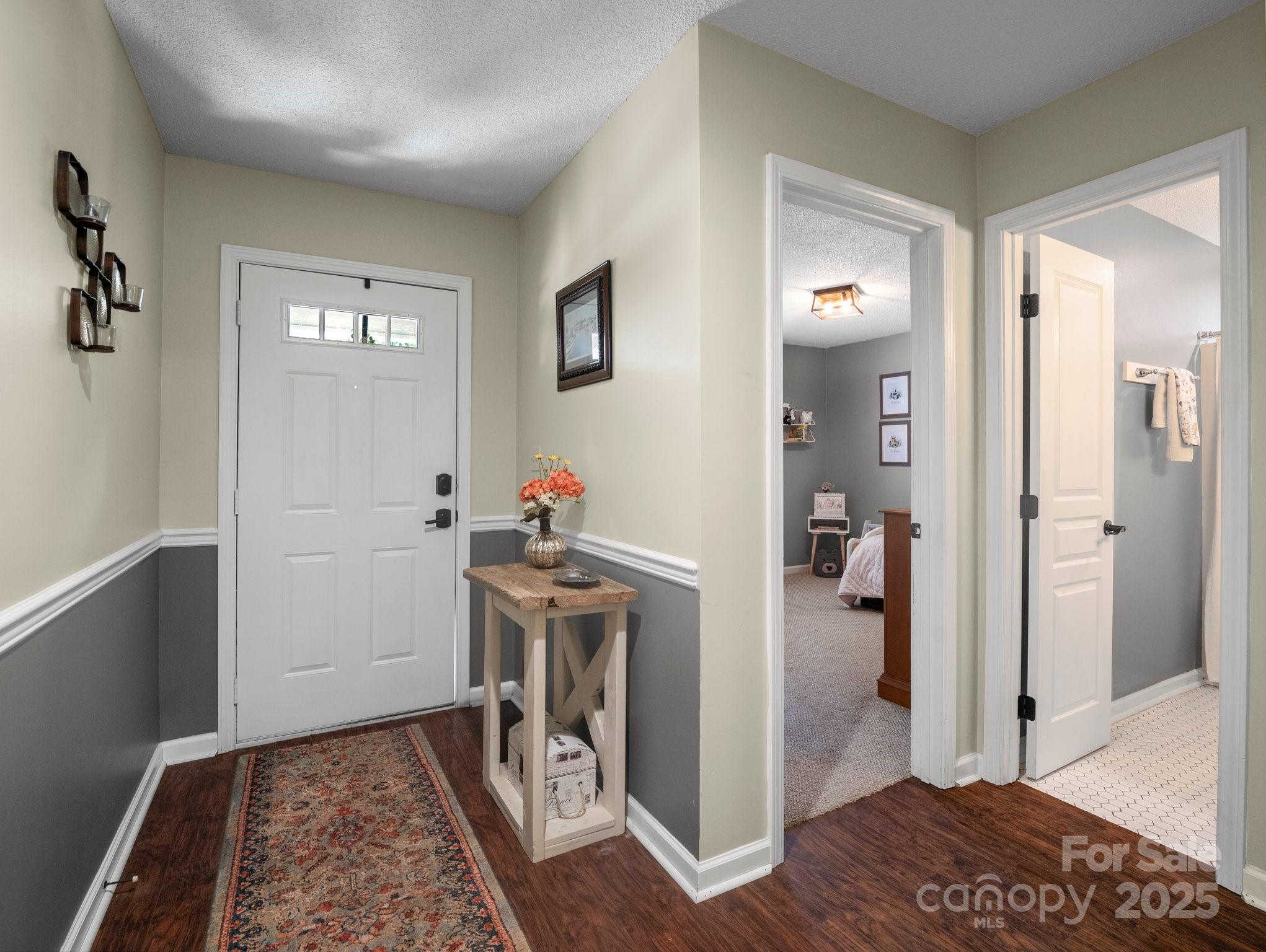 10 Gray Wolf Lane Hendersonville, NC 28792 - Photo 5 of 42 a view of entryway with livingroom and wooden floor