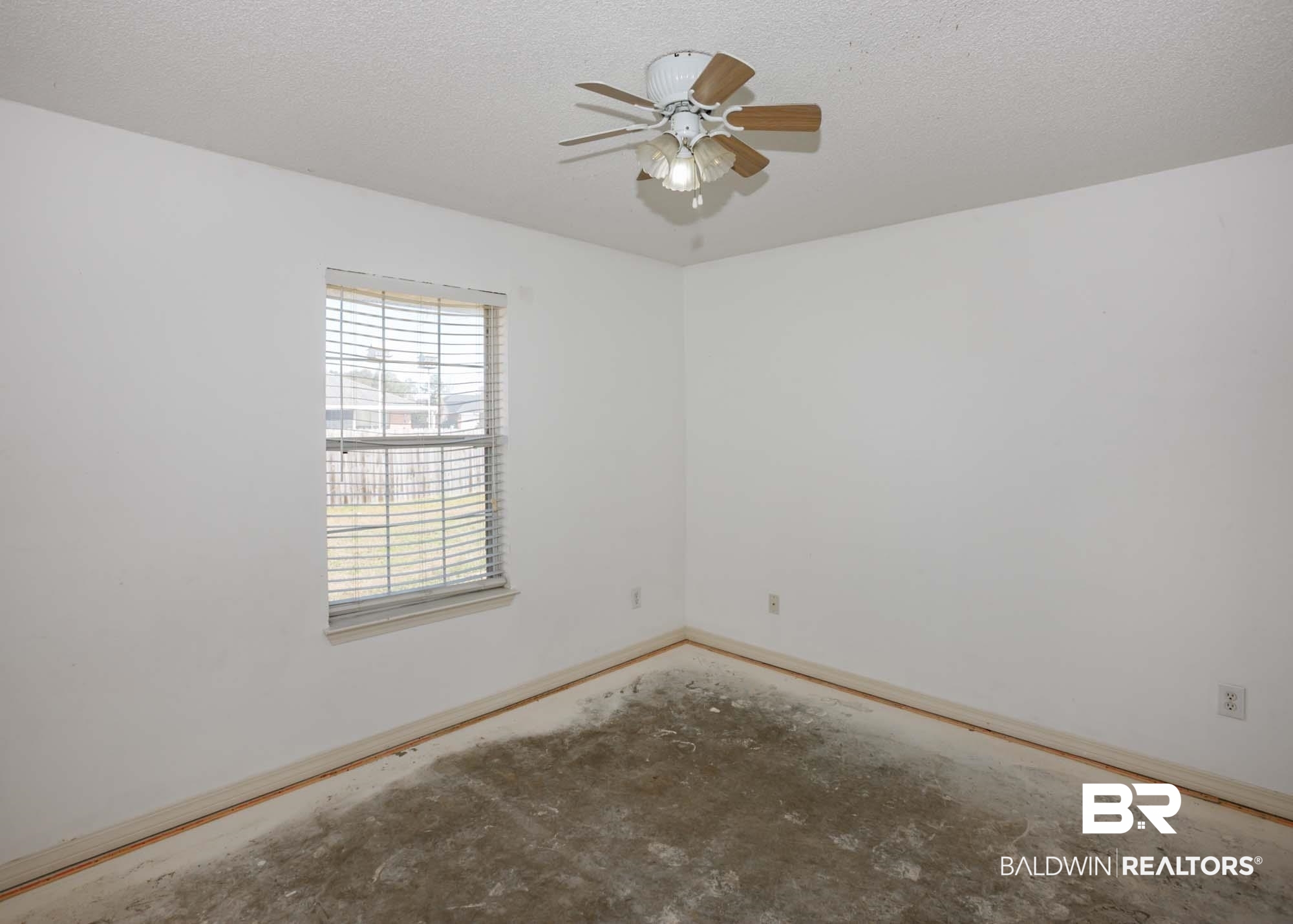 2530 Ashburn Lane Foley, AL 36535 - Photo 39 of 46 Unfurnished room with ceiling fan and a textured ceiling