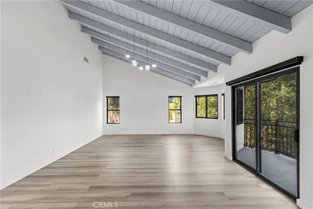 a bathroom with a double vanity sink mirror and shower
