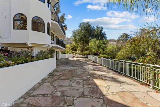 a view of a park with large trees