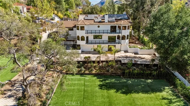 a view of a house with a big yard