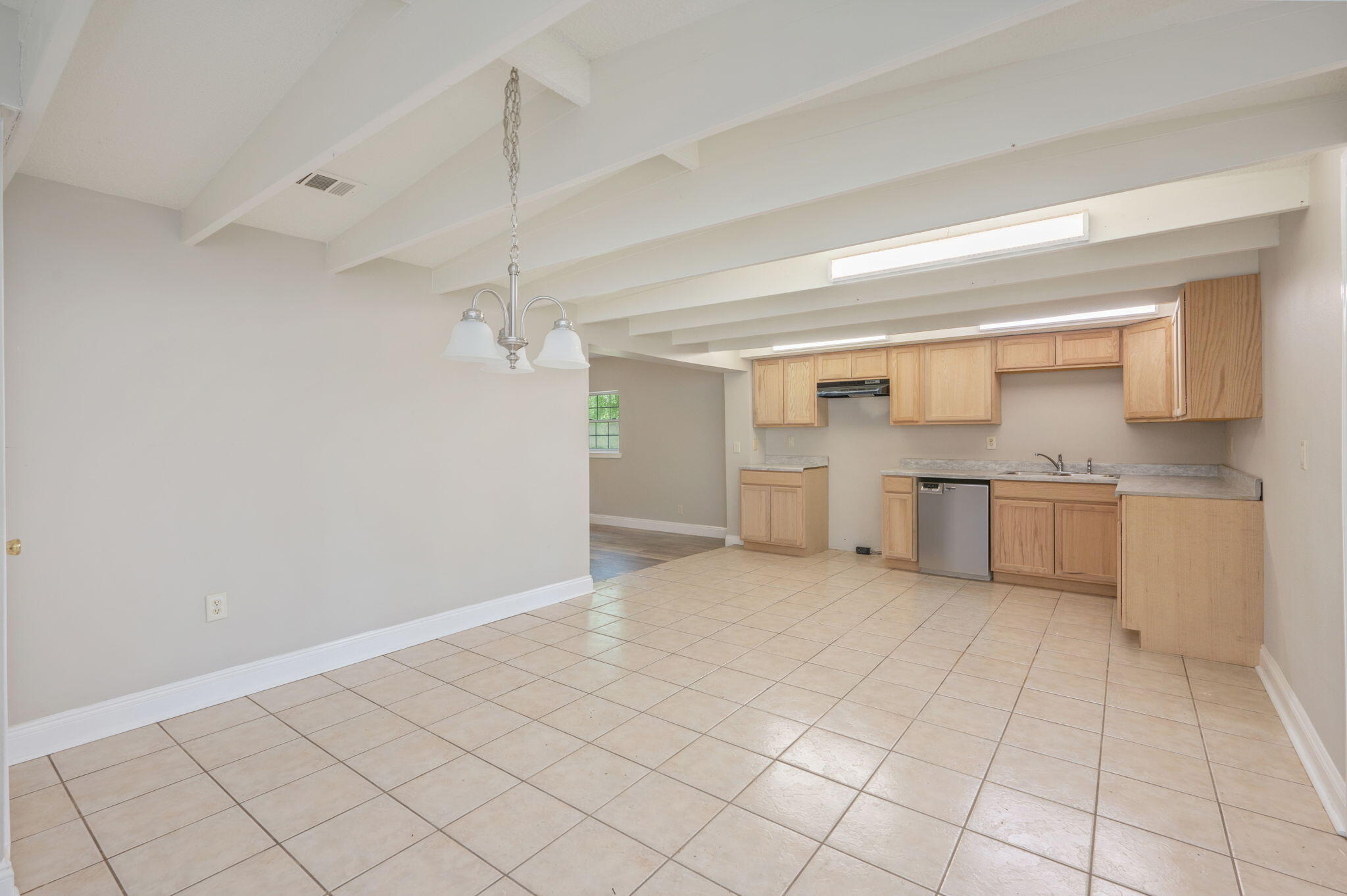 165 Smith Street Crestview, FL 32539 - Photo 12 of 30 a view of a kitchen with white cabinets and sink