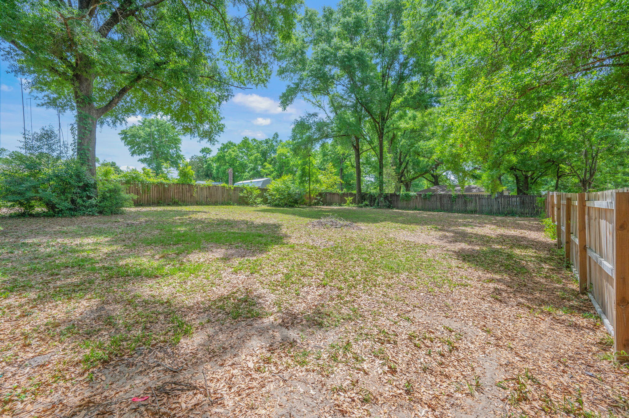 165 Smith Street Crestview, FL 32539 - Photo 27 of 30 a view of a yard with a trees