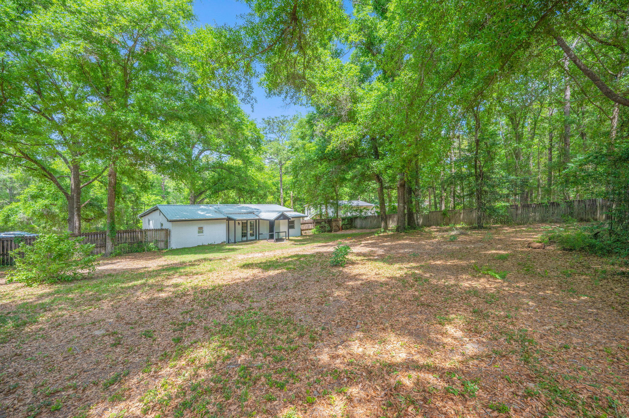 165 Smith Street Crestview, FL 32539 - Photo 28 of 30 a view of a outdoor space with a trees
